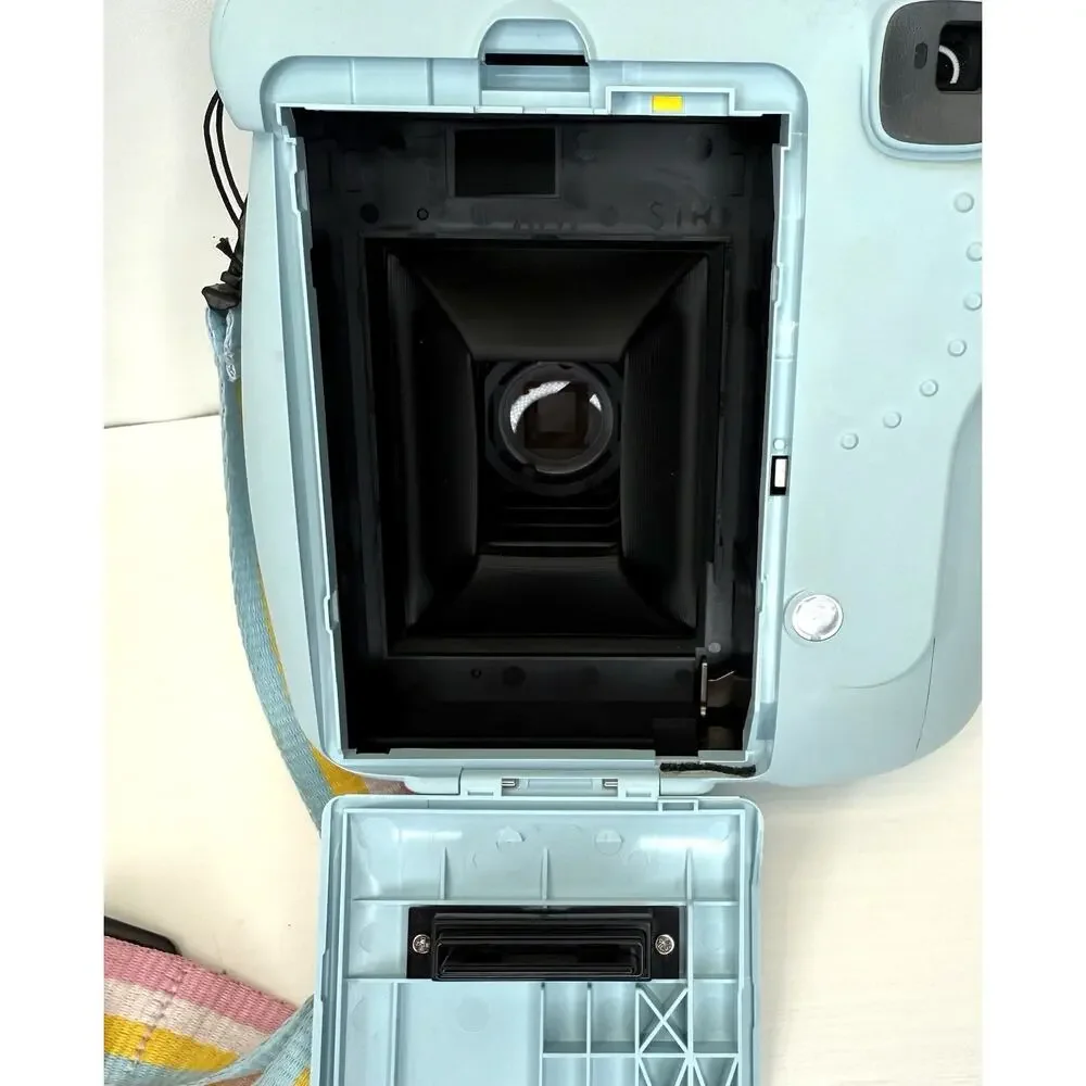 Fujifilm Instax Mini Instant Camera with Light Blue Case and Pastel Strap